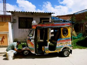 Hand painted colorful chivas of Guatapé